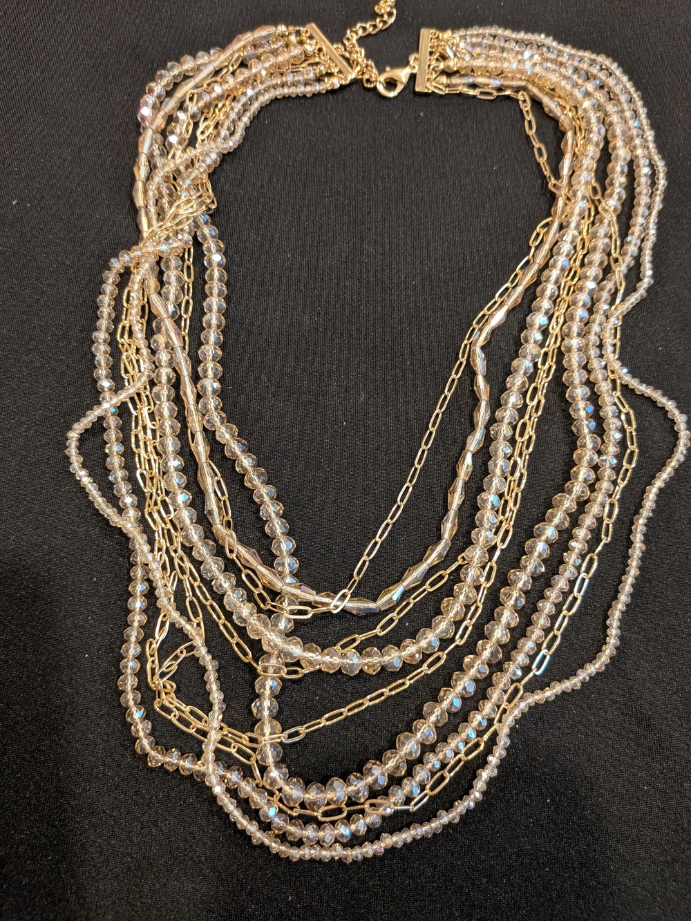 Layered Gold and Crystal Multi-Strand Necklace